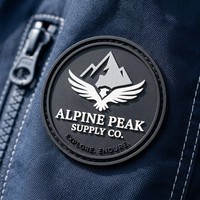Patch en silicone 3D personnalisé avec logo en relief pour vêtements d'extérieur et sacs à dos, étiquette en caoutchouc PVC souple avec rainure de couture, vente en gros