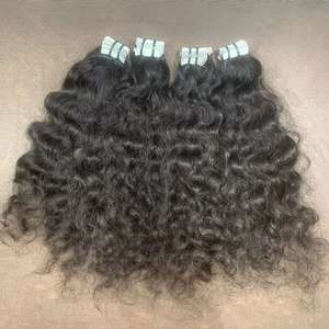 Trame de cheveux humains bruts du Temple de l'Inde du Sud Extensions de cheveux bouclés avec ruban adhésif Bundles de cheveux en gros - Product Image 1