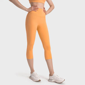 Collants de gymnastique athlétiques pour femmes 3/4 longueur taille haute Capris bout à bout couleurs unies sans couture avant beurre tissu poches sans couture - Product Image 5