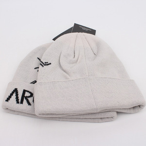 Gorros de punto con logotipo de texto bordado e imagen impresa Diseño personalizado Fabricantes de gorros cálidos de invierno en Vietnam - Product Image 1