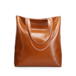 Sacs fourre-tout en cuir de vachette de qualité supérieure pour hommes Sacs fourre-tout en cuir confortables pour femmes Vente en gros OEM - Product Image 3