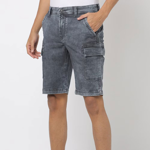 2025 pantalones cortos de mezclilla informales para hombres de secado rápido estilo único 100% algodón patrón sólido servicio OEM logotipo marca precio con descuento frontal - Product Image 1