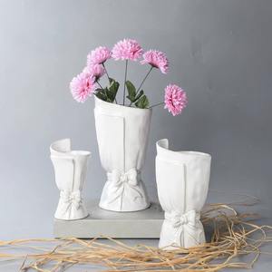 MARVELOUS ; white colored coated bowknot ceramic vases provides a sense of quality and premium craftsmanship - Product Image 4