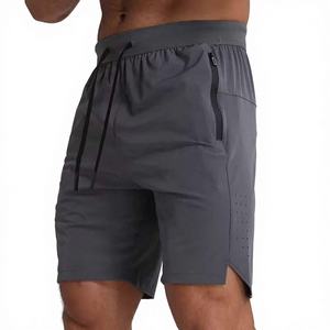 Pantalones cortos deportivos de lona transpirable de primera calidad para gimnasio, correr, trotar, con bolsillos con cremallera, de alta calidad, de secado rápido, holgados, de malla para hombre. - Product Image 1