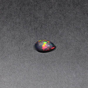 หินโอปอลหลากไฟสีดำธรรมชาติขนาด11x7มม. ลูกแพร์ Cabochon 1.80 CTS อัญมณีสำหรับทำเครื่องประดับ - Product Image 3