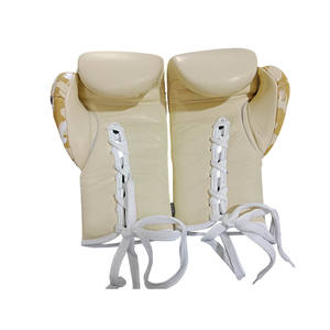 Libra x libra Guantes de boxeo de entrenamiento profesional Sacos de arena Guantes de boxeo Logotipo personalizado Guantes de kick boxing de cuero de vaca - Product Image 5