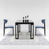 Ensemble de table à manger moderne minimaliste avec plateau en marbre carré, chaises rembourrées noires et bleues, structure en métal, 6 places, pour la maison, le café, l'hôtel