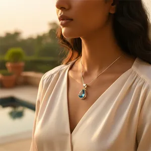 Pendentif en argent 925 en forme de larme avec topaze bleue, plaqué rhodium, or rose et motif de bouclier en platine, charme pour femme, bijoux cadeau - Product Image 1