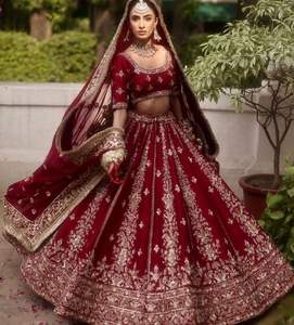 2025-Hermoso Lehenga Choli nupcial adornado con perlas Dabka pesadas Mano de piedra Zardozi Trabajo de bordado con Dupatta pesado - Product Image 1