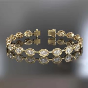 Pulsera de tenis de moissanita cultivada en laboratorio para mujer Pulsera ovalada de eternidad sólida de oro de 14K para bodas y ocasiones especiales - Product Image 1