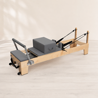 Tempat Tidur Pilates Reformer dengan Rangka Kayu Maple Amerika Utara yang Kokoh dan Tahanan yang Dapat Disesuaikan untuk Kelas Pribadi dan Kelompok