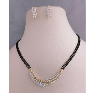 Fancy Look <b>Gold</b> Plated Mangalsutra <b>Set</b> With CZ Pendant And Matching <b>Earrings</b> Perfect For Daily Wear And Timeless Charm - Product Image 1