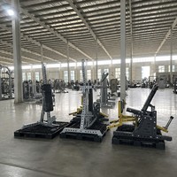 Machine à fessiers et à tibialis à charge libre robuste avec siège réglable pour l'entraînement de force en salle de sport commerciale