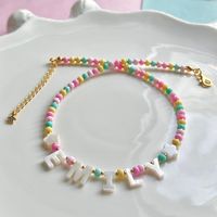 Collier ras du cou ajustable en perles fines multicolores avec lettre en nacre, bijou fantaisie en perles de rocaille pour femme, idéal comme cadeau