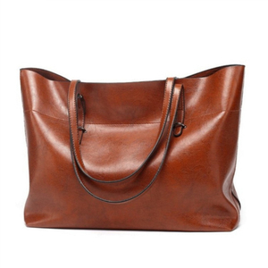 Nueva moda de alta calidad, diseño personalizado, Material de cuero de gran capacidad, bolso de hombro de cuero para mujer en varios colores - Product Image 1