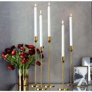 Lujoso candelabro de metal pulido dorado y negro, perfecto para mesas de comedor y salas de estar modernas - Product Image 5