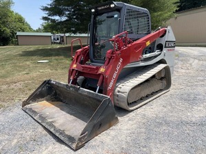 Chargeuse compacte Takeuchi TL12R2 EROPS avec climatisation, radio, caméra arrière, coupleur hydraulique 2 vitesses, hydraulique auxiliaire, godet de 84 pouces, commande au volant, en excellent état de fonctionnement - Product Image 3