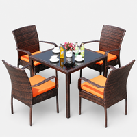 Ensemble de chaises en rotin minimalistes modernes pour l'extérieur, avec structure en fer forgé mobile, table et chaises de loisirs pour patios, jardins, balcons
