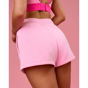 กางเกงขาสั้นกีฬา We Rise Pink Rose ประดับเพชรสำหรับผู้หญิง - Product Image 2