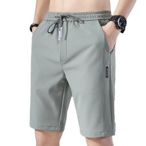 Pantalones cortos de dormir para hombre, pantalones cortos informales de verano para hombre, cintura elástica, rectos, color sólido, seda helada, deportes, bolsillo fino, hasta la rodilla, pantalones para hombre - Product Image 3