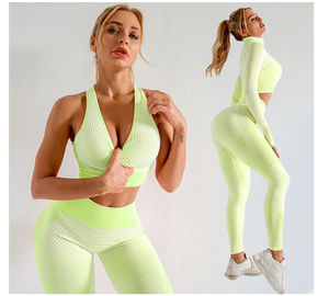 Ensembles de fitness pour femmes motif solide Leggings taille haute et dos ouvert haut à manches courtes Logo sur le devant nouveaux vêtements de yoga de sport - Product Image 1