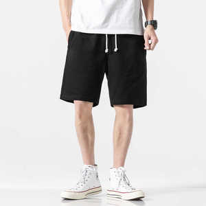 Pantalones cortos con cordón de algodón 100% de marca personalizada del fabricante para hombre, estilo callejero, patrón sólido, cintura elástica informal para el sudor - Product Image 1