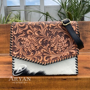 Vente en gros personnalisée OEM 2025 Nouveau design Sacs à main tendance en cuir de vachette usiné Sac à bandoulière en cuir véritable pour femmes - Product Image 1