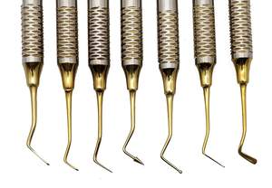 Ionómetro de vidrio compuesto Dental, instrumentos de llenado de amalgama, 7 piezas recubiertas de Plasma dorado - Product Image 3