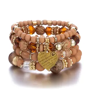 Best-seller Vente en gros de bracelets multicouches de style ethnique bohème avec perles cœur en cristal Bijoux pour femmes à la main