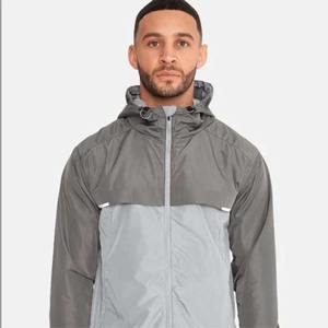 Wholesale Windbreaker <b>Jackets</b> Lightweight, Waterproof, and Breathable Hooded <b>Jackets</b> for Outdoor and Casual Wear - Product Image 1