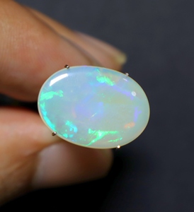 โอปอลธรรมชาติจากออสเตรเลียทรงรี 4 กะรัต คุณภาพสูง งานแฮนด์เมด - Product Image 1