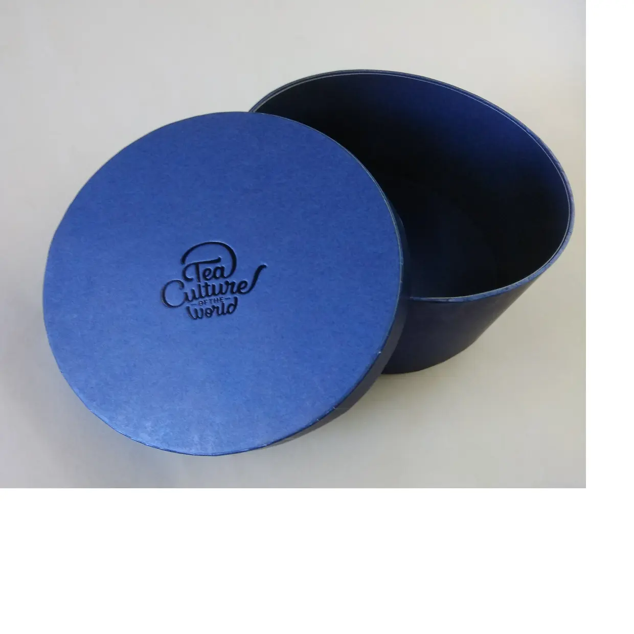 custom made blue coloured round paper boxes for tea packaging, gifting & candle packaging for resale and for promotion