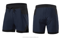 Shorts de course pour femmes en polyester et élasthanne, à blocs de couleur, séchage rapide, avec cordon de serrage à la taille, coupe régulière, longueur courte