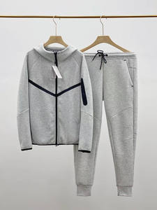 Conjunto de chándales de algodón 100% de punto con estampado de 2 piezas con capucha y cremallera para entrenamiento de gimnasia informal de invierno con logotipo personalizado para hombre - Product Image 1