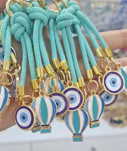 Porte-clés mousqueton en alliage de zinc avec breloque poisson et amulette Nazar bleue émaillée, souvenir d'Istanbul - Product Image 4