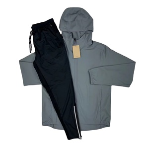 Ensemble coupe-vent unisexe léger, veste et pantalon respirants et imperméables, parfait pour la course à pied et la randonnée en plein air - Product Image 1