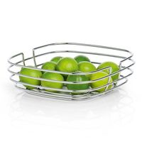 Corbeille à fruits décorative en métal avec un design artistique, idéale pour embellir les centres de table de la salle à manger et la décoration de la cuisine