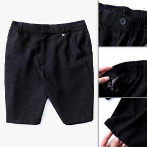 HT07 Pantalones cortos informales para hombre hechos de tela transpirable duoi con diseño de cintura con botones que brindan comodidad y facilidad para el uso diario de verano - Product Image 5