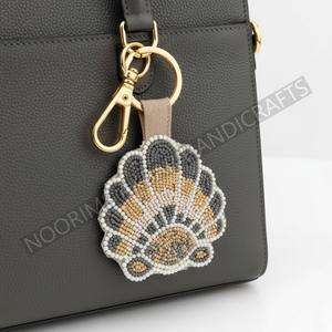 Round embroidered bead <b>tag</b> for wholesalers offering colorful craft accessories - Product Image 2