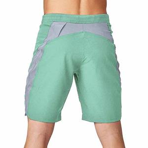 Shorts de sport pour homme de haute qualité, couleur unie, polyester/coton, respirants, séchage rapide, avec poches, adaptés au jogging - Product Image 2