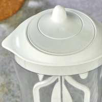 Bouteille d'eau en acrylique transparente de grande capacité (2200 ml/74 oz) au design moderne, écologique, avec couvercle mélangeur, pour usage professionnel et stockage de boissons froides