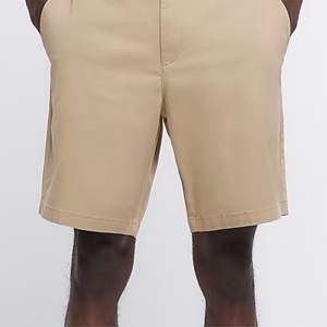 กางเกงขาสั้นชิโน่สลิมฟิตสีเบจและสีเบจผ้าฝ้าย98% กันลื่นด้านข้างกระเป๋าเข็มขัดห่วงกระดุมและซิปยึด - Product Image 6