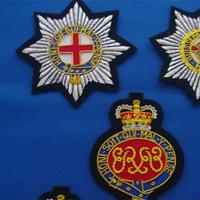 C'est un insigne brodé représentant l'emblème des Gardes du Froid, l'un des régiments les plus anciens de l'armée britannique.