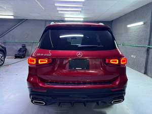 SUV 2024 d'occasion, 7 places, 400 CV+, 4.1-6L atmosphérique, transmission automatique 9 vitesses, essence foncé - Product Image 2