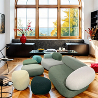 Canapé modulable en tissu en forme de L, style galets, pour salon minimaliste ou salle d'attente