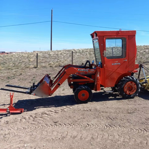 Kubota mini tractor con cabina | Usado Kubota Tractor con cabina Segadora Pala cargadora frontal y retroexcavadora implementos para la venta - Product Image 1