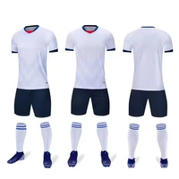 Venta al por mayor de fábrica: Conjuntos de camisetas de fútbol 100% poliéster, trajes de fútbol personalizados con estampado, antibacterianos, transpirables y ligeros.
