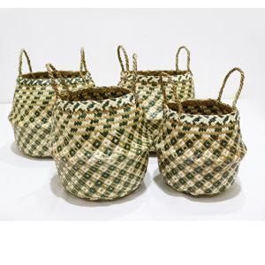 Cesta de hoja de palma redonda única de alta calidad tejida a mano en Vietnam para decoración del hogar y cajas y contenedores de almacenamiento de embalaje de alimentos - Product Image 1