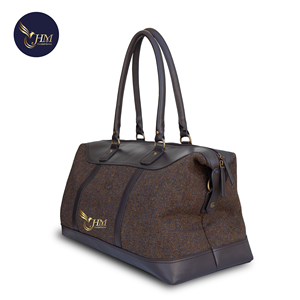 กระเป๋าเดินทางแบบดัฟเฟิลทำจากขนสัตว์แท้พรีเมียม แต่งด้วยหนังแท้ ใช้งานได้หลากหลาย เหมาะสำหรับการเดินทางช่วงสุดสัปดาห์ - Product Image 3