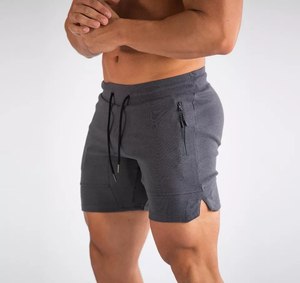 Pantalones cortos de entrenamiento de compresión con logotipo personalizado para hombre Pantalones cortos de gimnasio de malla de patrón sólido con estilo informal de bolsillo - Product Image 4